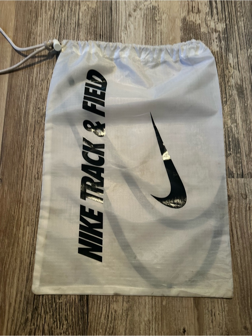 Nike White Drawstring Track & Field Gym Bag with Black Logo